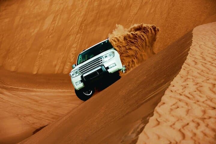 Evening Desert Safari with Belly Dance and BBQ Dinner and Camel Ride
