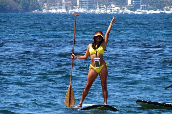 Paddleboarden bij Acapulco's Bay