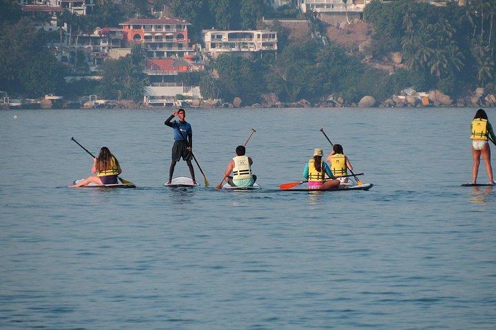 Padleboarding ved Acapulco's Bay