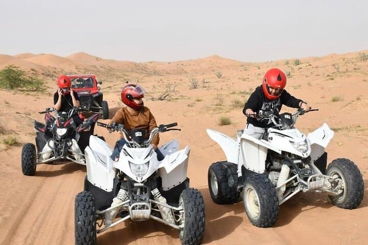 Desert Safari W/BBQ Dinner, Quad Bike, Camel Ride, & Sandboarding