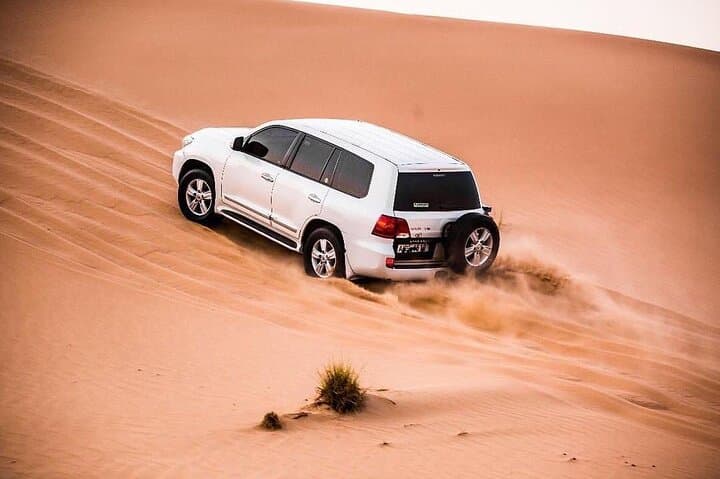 Dubia 4x4 Dune Bashing, Sandboarding, Camel Riding and Bbq Dinner