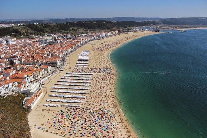 Tour privato di 4 città di un'intera giornata in Portogallo da Lisbona