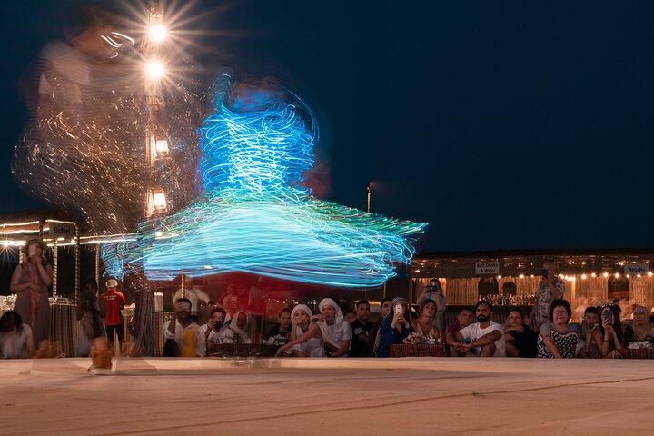 Desert Safari with Dune Bashing, Camel Ride, BBQ Dinner, Sand Board & Live Shows
