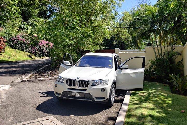 プライベート往復空港 (UVF) 送迎: ラグジュアリー SUV