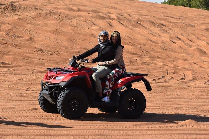 Dubai Quad Bike Tour with Camel Ride and BBQ Dinner
