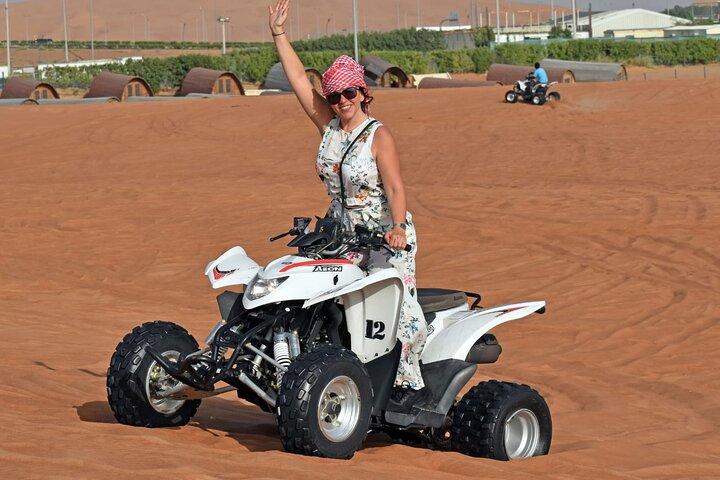 Dubai Quad Bike Tour with Camel Ride and BBQ Dinner