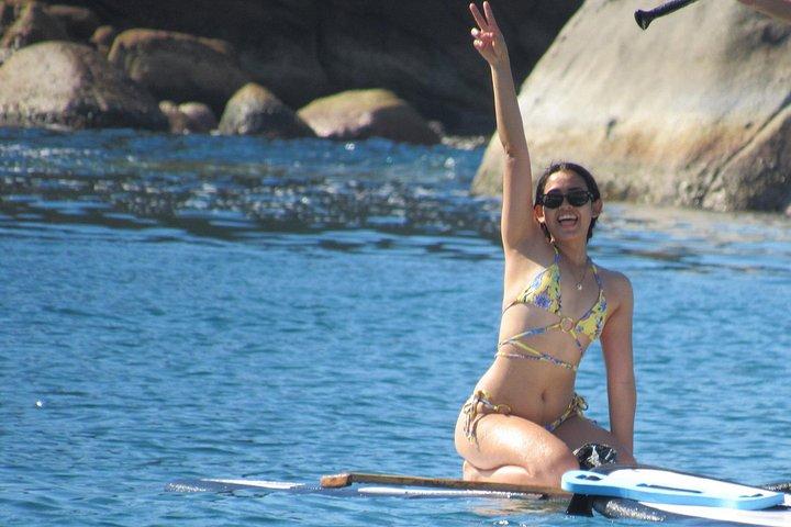 Padleboarding ved Acapulco's Bay