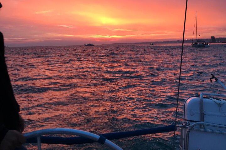 Sunset sailboat tour in Lisbon with green wine