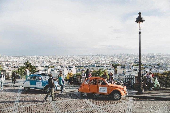 ホテルピックアップ付きの6時間のモンマルトルとラヴァレヴィレッジのプライベートショッピング旅行