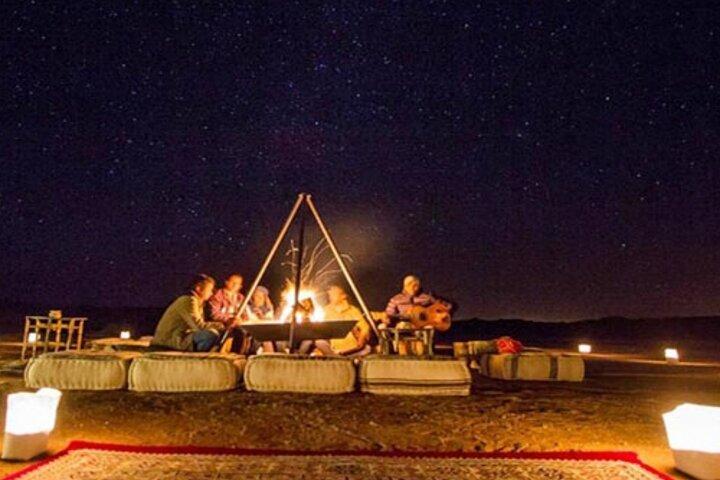 Marical dinner and camel ride at sunset in Desert of Marrakech