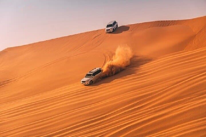 Dubai Desert Safari, Quad Bike, Camel Ride, and Buffet Dinner