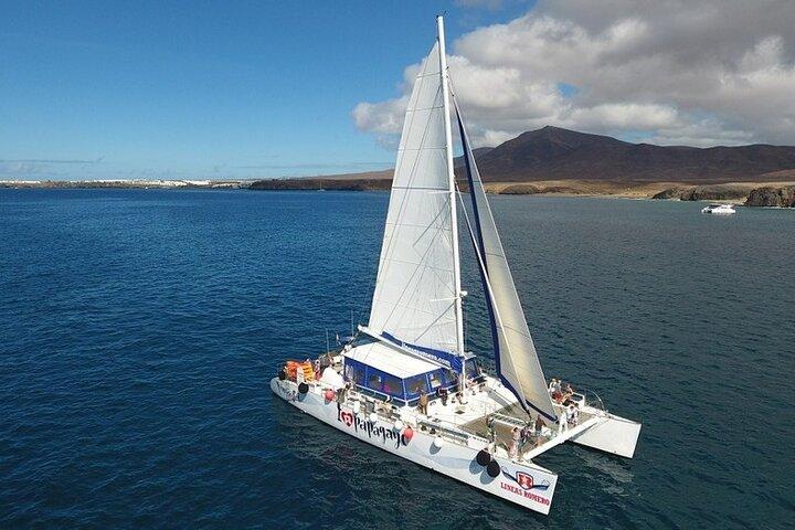 Catamaranervaring naar Papagayo's stranden met lunch en drankjes