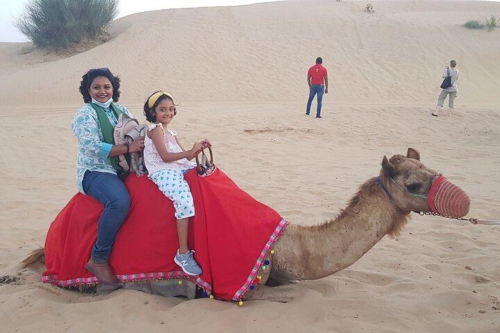 Red Dune Bashing con Quad Bike Sandboard Camel Ride e cena barbecue