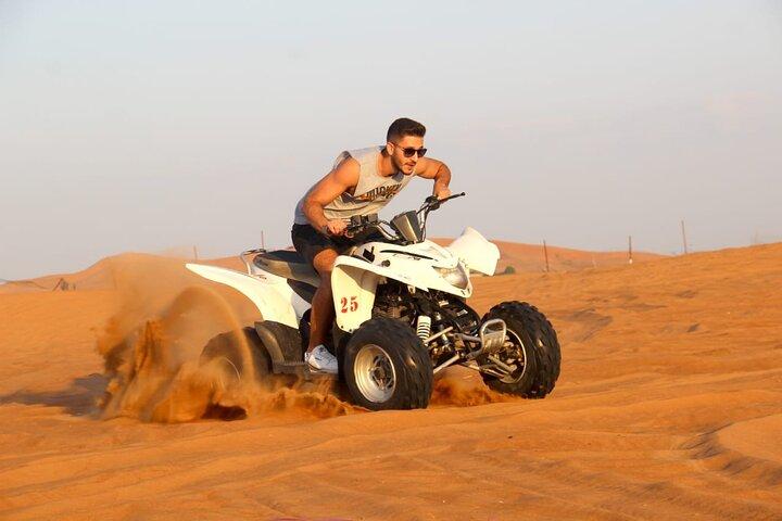 Red Dune Bashing con Quad Bike Sandboard Camel Ride e cena barbecue