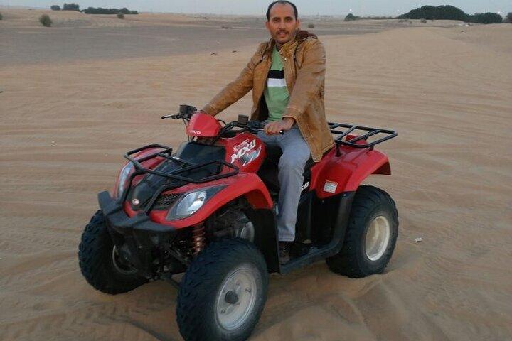 Red Dune Bashing con Quad Bike Sandboard Camel Ride e cena barbecue