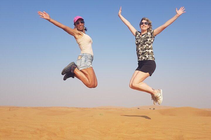 Red Dune Bashing con Quad Bike Sandboard Camel Ride e cena barbecue