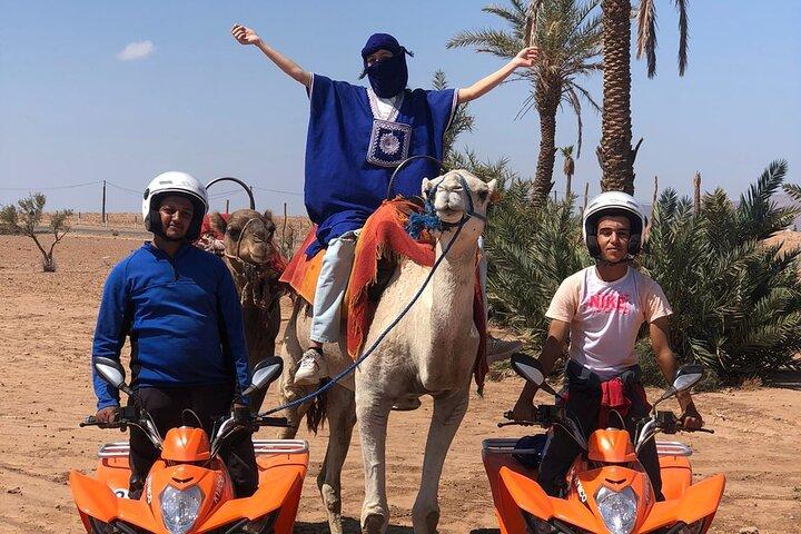 Sensational quad and camel ride in the palm grove