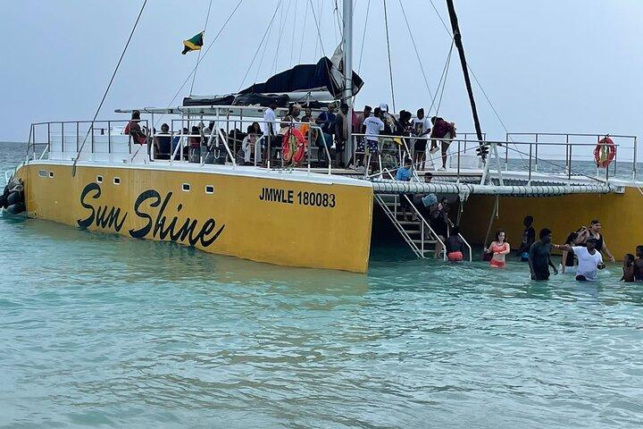 Excursão guiada privada de dia inteiro à Seven-Mile Beach e Ricks Café