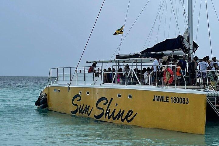 Excursão guiada privada de dia inteiro à Seven-Mile Beach e Ricks Café