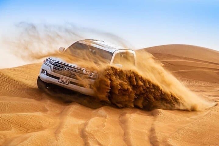 Morning Desert Safari in Dubai with Camel Ride and Sandboarding