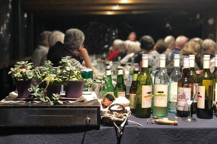 Cena progressiva alle case dell'isola