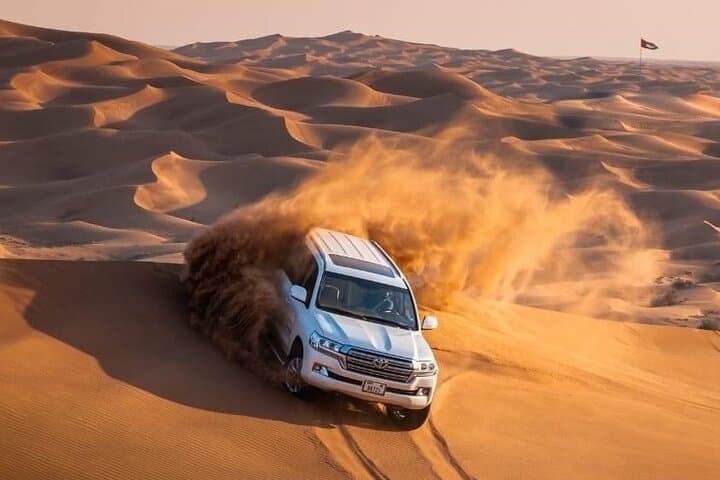 Morning Red Dunes Safari: Camel Ride & Sandboarding Adventure