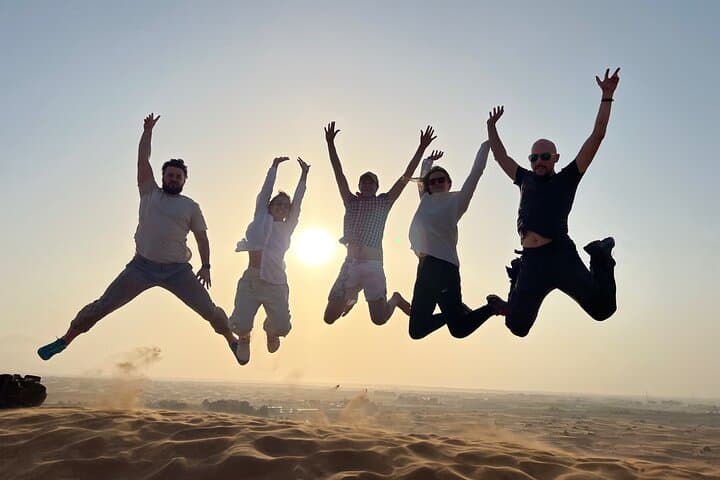 Sunset Safari with BBQ Dune Drive Camel Ride & Dune Buggy option