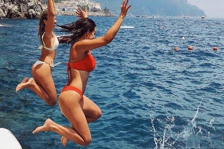 Excursão de barco particular de meio dia pela Costa Amalfitana saindo de Positano