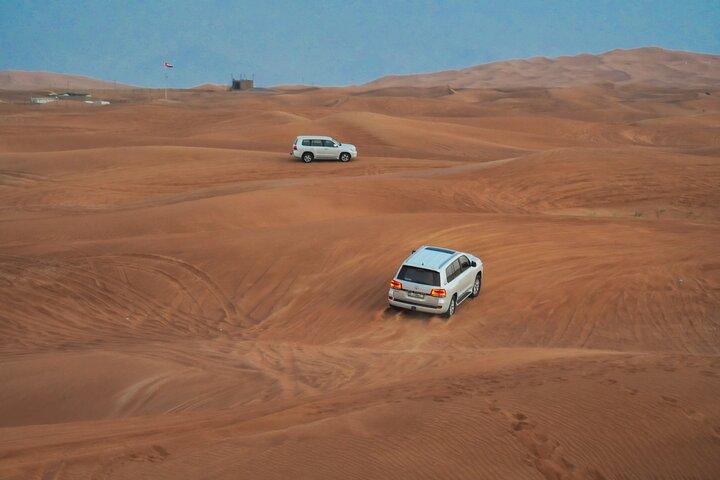 Safari dans le désert en soirée à Dubaï, quad, spectacles vivants et dîner barbecue