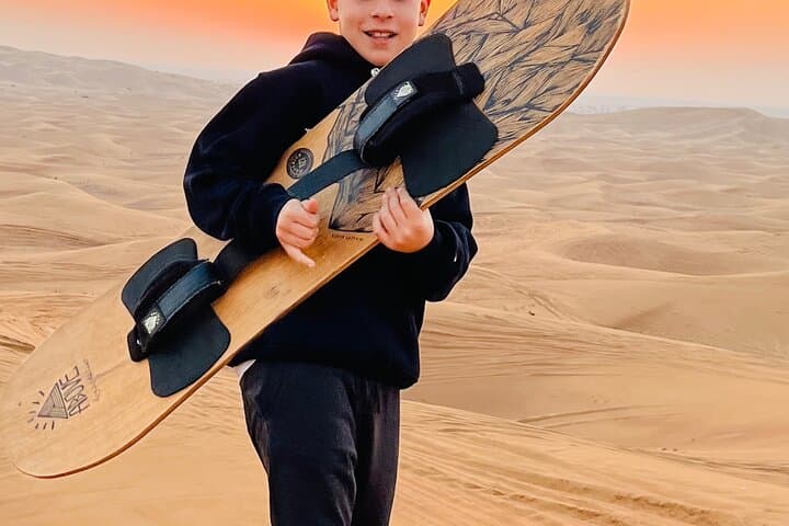 Morning Red Dune Safari with Sandboarding and Camel Ride
