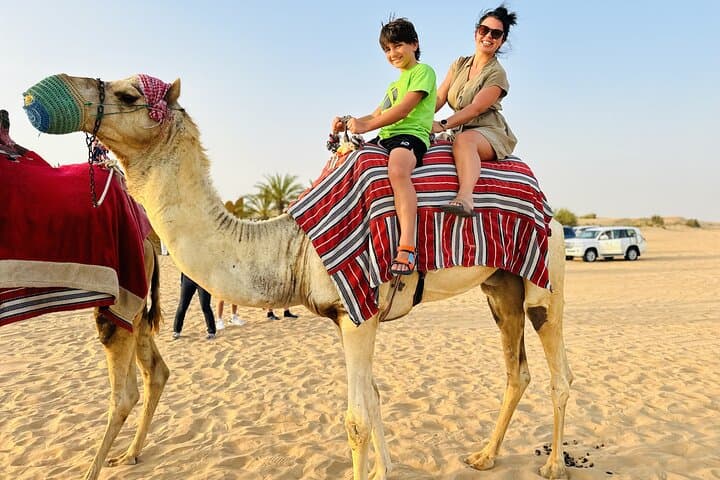 Best Dubai Desert Safari with Buffet Dinner,Sand Boarding & Shows