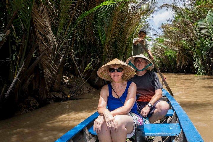 Excursão guiada de dia inteiro pelos túneis de Cu Chi e delta do Mekong