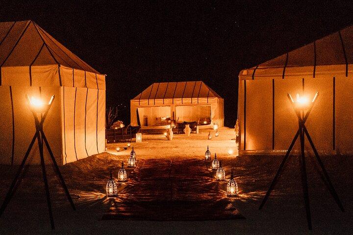 Sunset camel ride with dinner and show