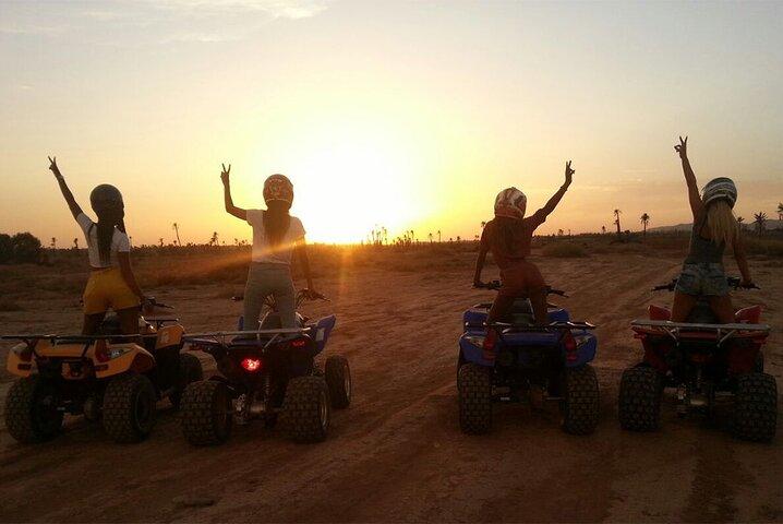 ATV ride in the desert palm grove Marrakech