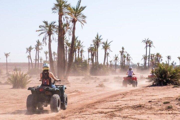 ATV ride in the desert palm grove Marrakech