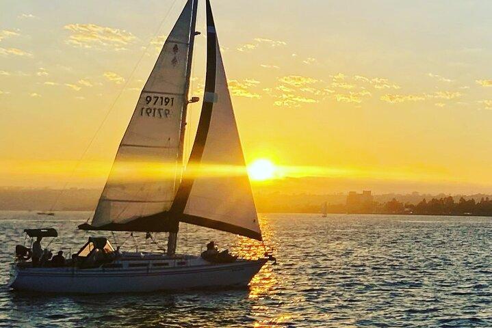 Coucher de soleil de luxe et voile de jour Petit groupe