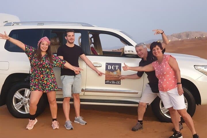 Dubai Desert Safari With Sandboarding & Camel Riding