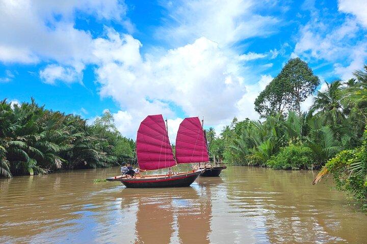 Visita de dia inteiro ao Mekong Zigzag: Scooter, Sailboat, Food (HCM-BenTre)