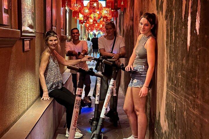 Bangkok de noche con Escooter y/o bicicleta