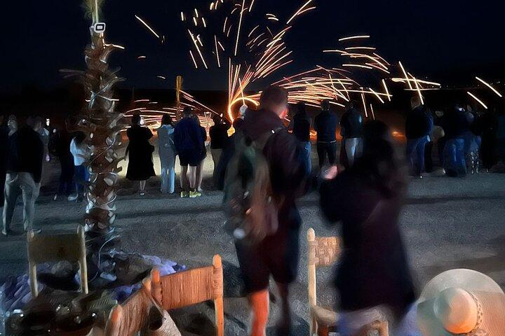 Esperienza con cena magica e giro in cammello al tramonto nel deserto di Marrakech
