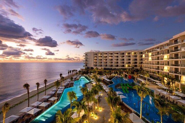 Aeroporto de Cancún e traslado particular Hilton Cancun Mar Caribe