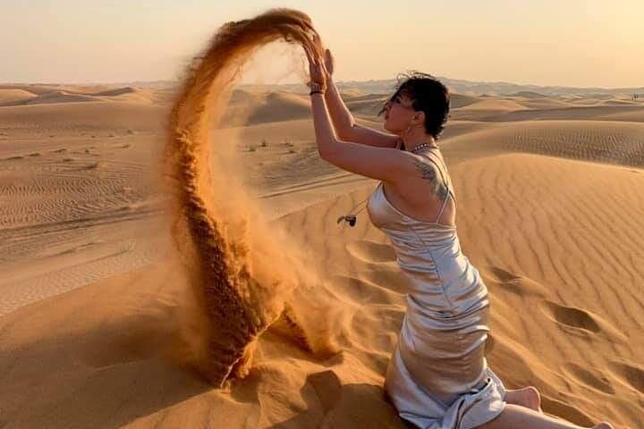 Dubai Desert Safari With Sandboarding & Camel Riding