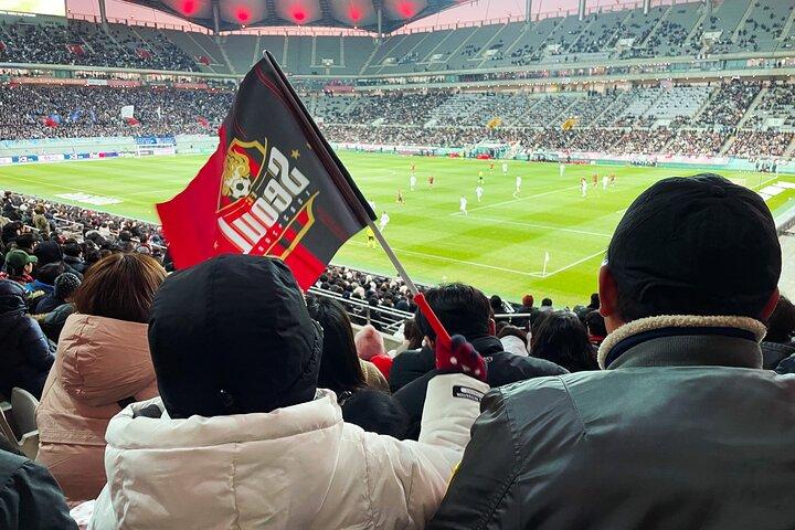 ガイド付き K フード体験付きソウルでのスポーツ試合