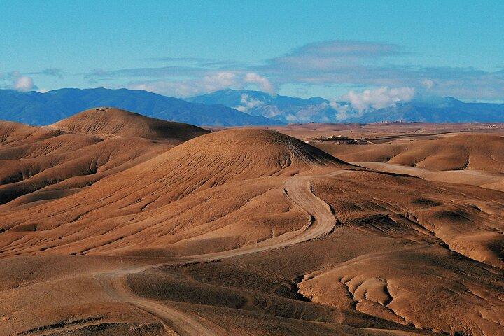 Quad, camel and dinner with show in the desert of Agafay