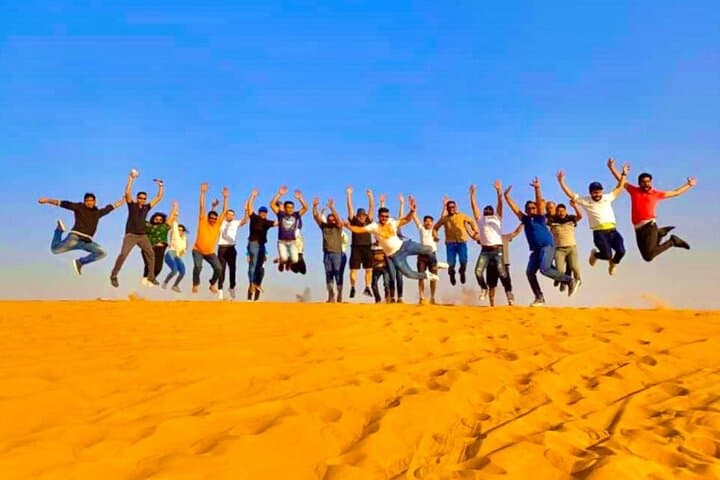 Evening Desert Safari with Camel Ride, BBQ Dinner and Dune Bashing