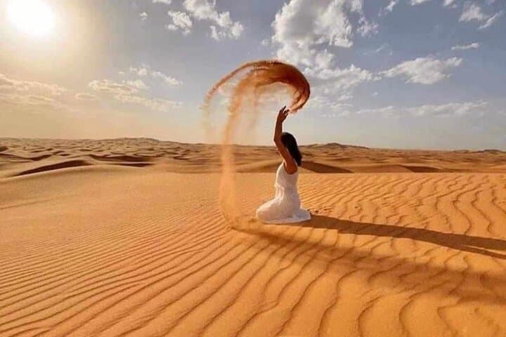 Evening Desert Safari with Camel Ride, BBQ Dinner and Dune Bashing