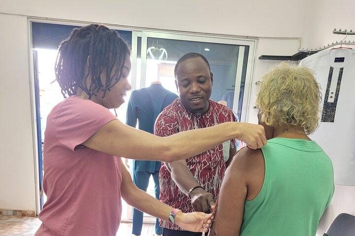 African custom clothing making experience with fabric tour