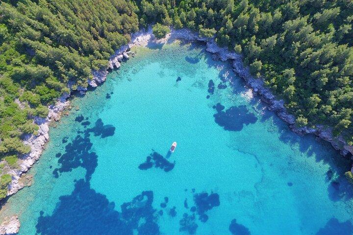 Grotta blu/verde - Spiaggia di sabbia