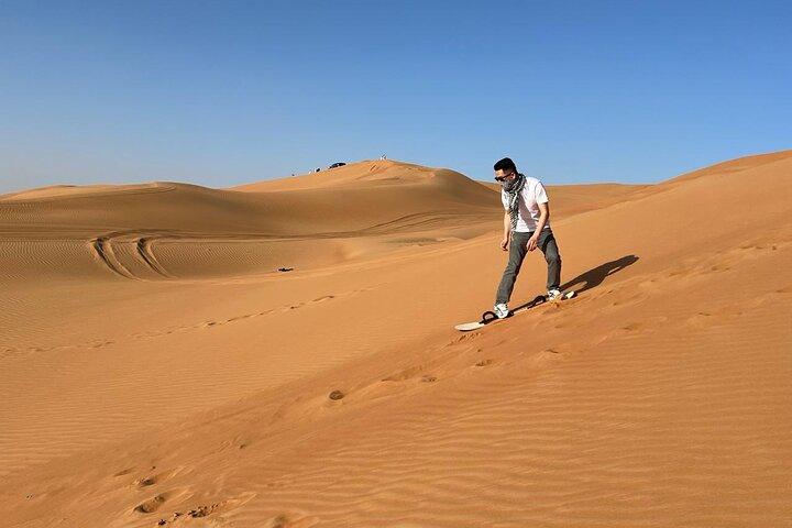 Premium Camp Red Dune Desert Safari Camel Ride och sandboarding