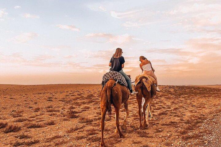 Sunset camel ride with dinner and show